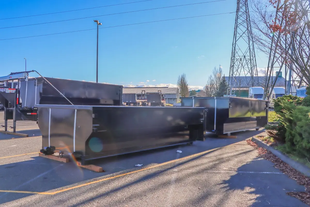 Roll-off dumpster ready for waste disposal at job site for Concrete Dumpster Rental in Minneapolis